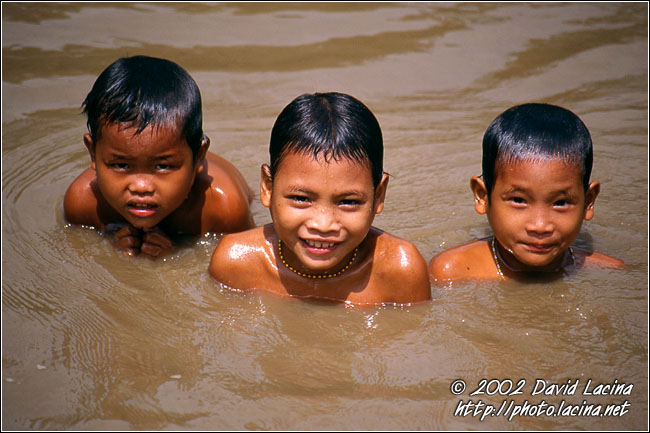 Mentawai Children Taking Bath In River - Siberut island, Indonesia