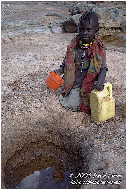 Turkana Girl Getting Water - Turkana Tribe, Kenya