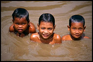 Mentawai Children Taking Bath In River, Siberut island, Indonesia