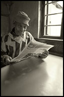 Reading Newspapers, Colorized Tanzania, Tanzania
